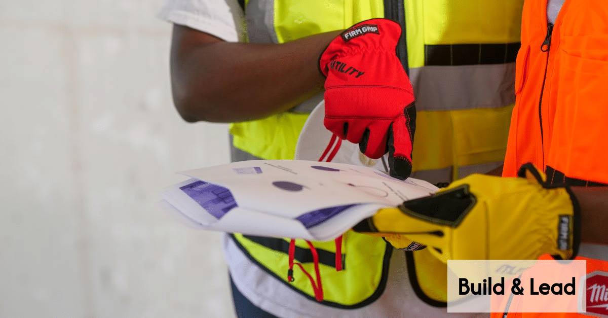 Construction coordinator inspecting site documents