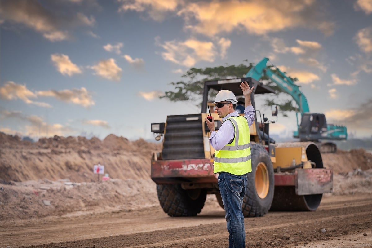 Construction worker on site with radio